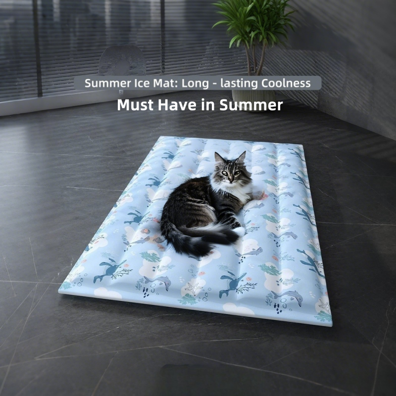 Cat lying on a blue ice mat with animal patterns on a dark floor.