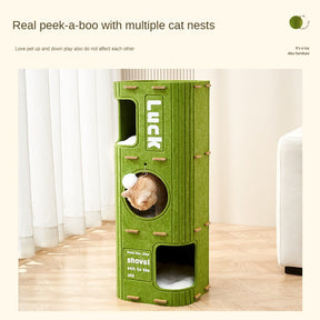 Cat entering felt bucket hideout area inside modern cat tower
