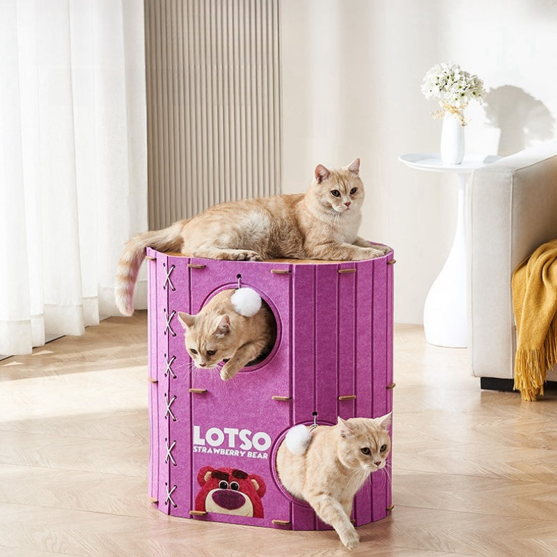 Cat exploring BABEECATS enclosed felt cat cave bed tower, strawberry bear pink design